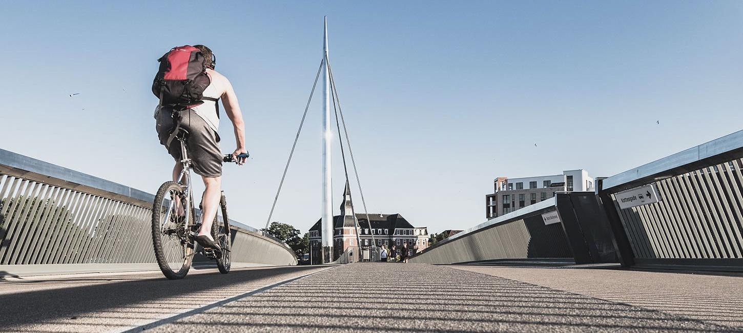 Cyclist on the City Bridge