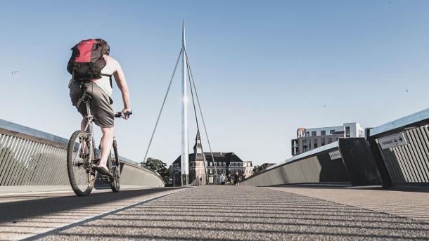 Cyclist on the City Bridge