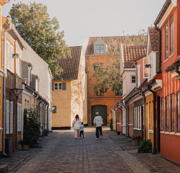Family in the old town 2025