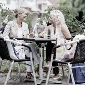 Two girls taking a break from shopping