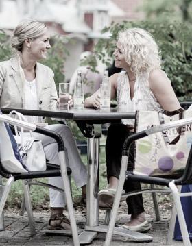 Two girls taking a break from shopping